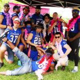 Football players posing on My Studio Party's red carpet for Teen Birthday party Package