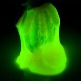 Hand holding green neon slime