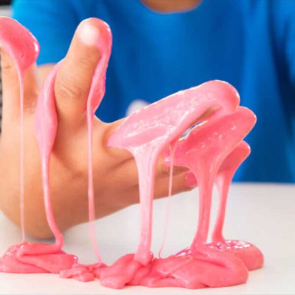 fluffy pink slime on a hand