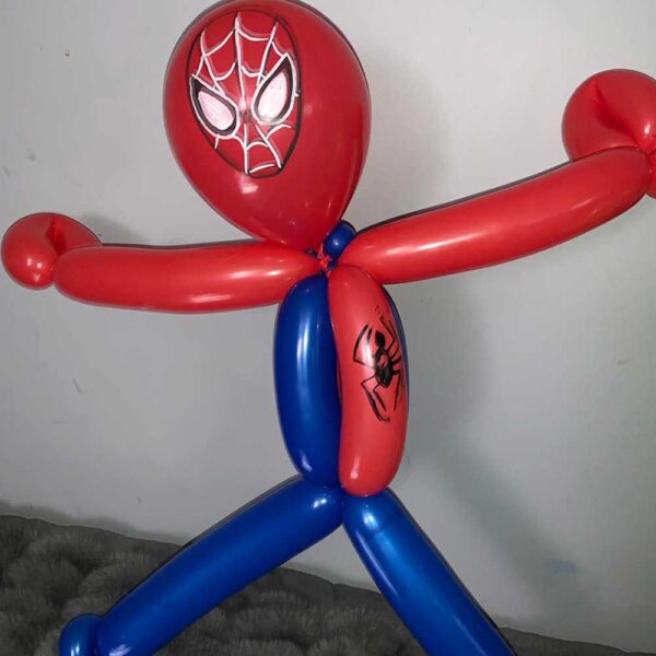 balloon twisting spiderman with hands extended