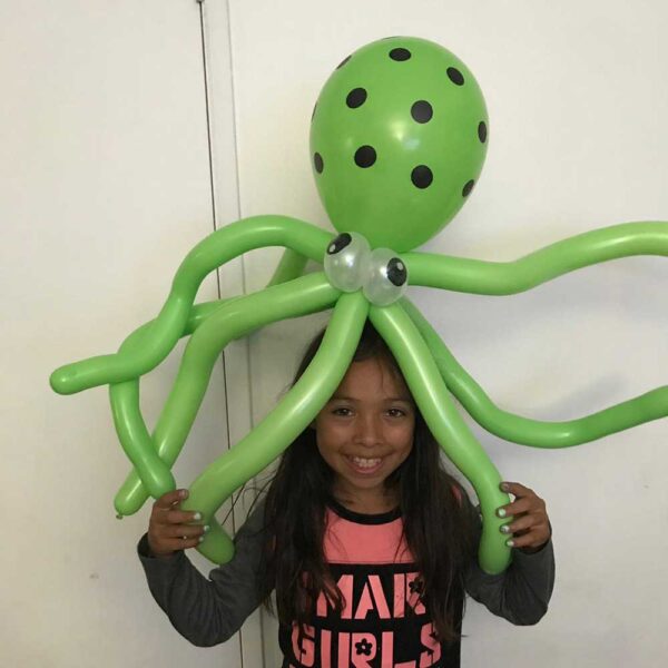 balloon twisting with green octopus