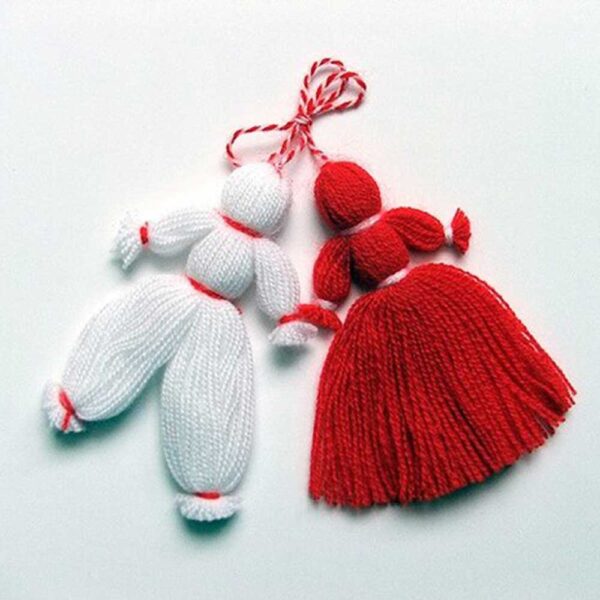traditional bulgarian red and white yarn dolls