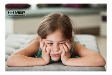 Bored child sitting indoors with head in hands, illustrating how boredom can inspire creativity and confidence in kids.